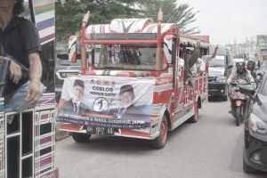 Ambil Tema Merakyat, Mobil Hias Dengan Ornamen Militer Ramaikan Pawai Kampanye Damai Romi-Sudirman