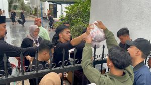 Kejati Jambi Sembelih 14 Ekor Sapi dan Bagikan Daging Kurban ke Masyarakat
